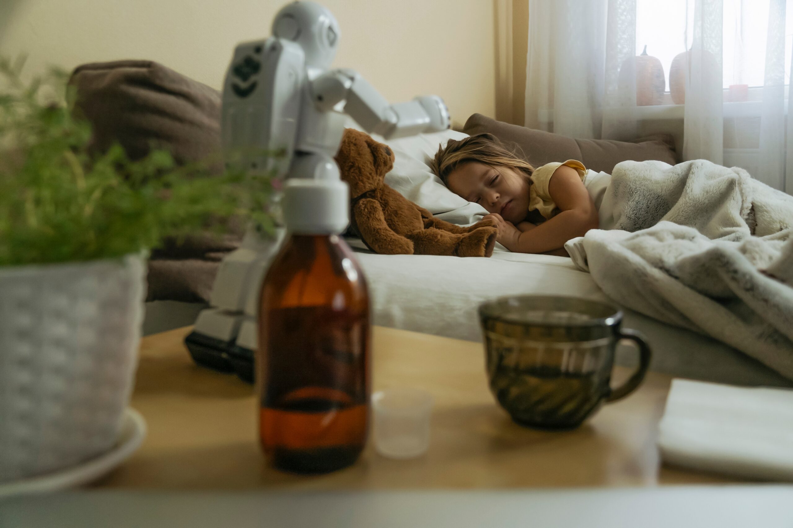 Sick,Little,Girl,Sleeping,In,Bed,With,Toy,Bear,And